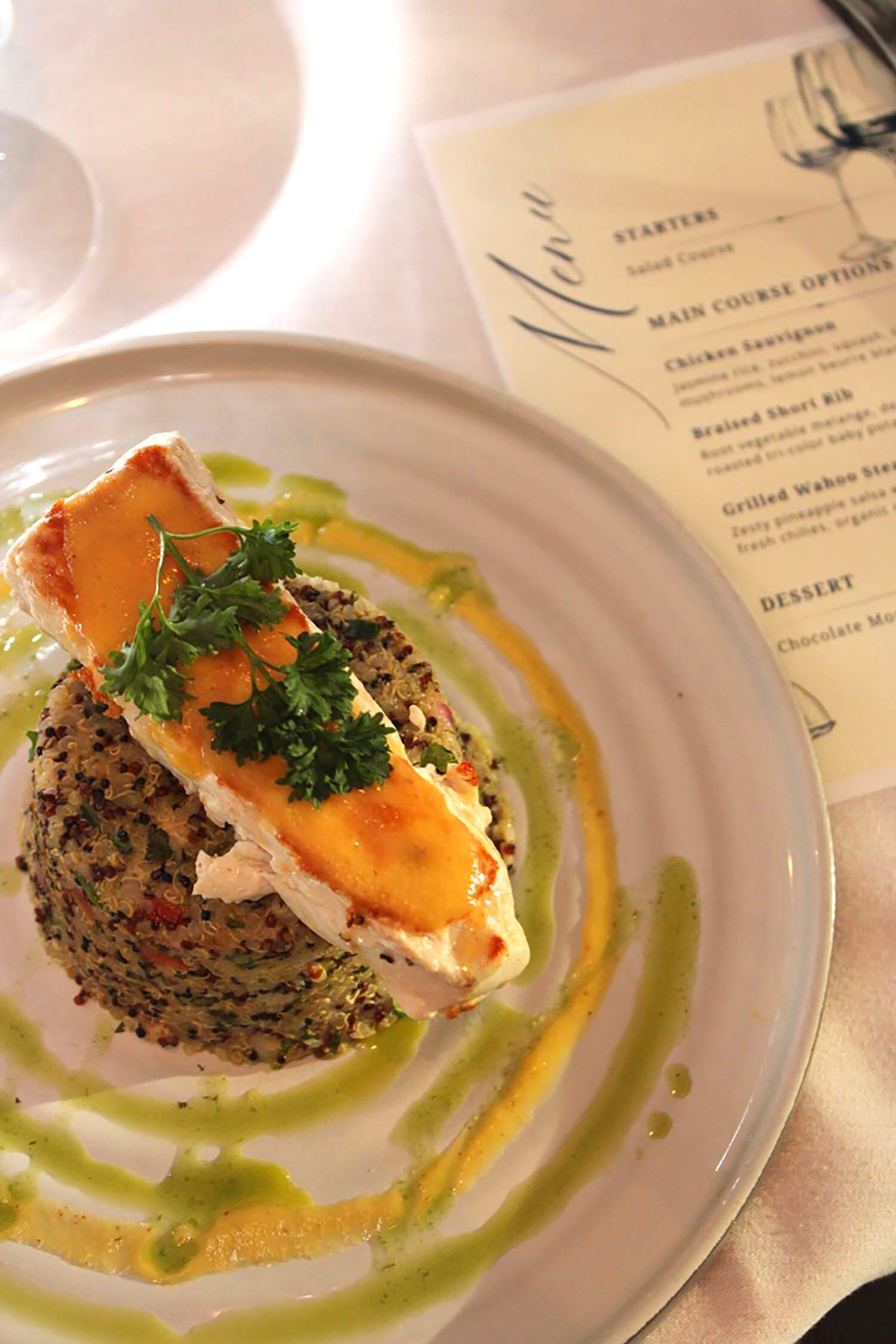 A plated dish and drink at Spritz City Bistro in Stuart