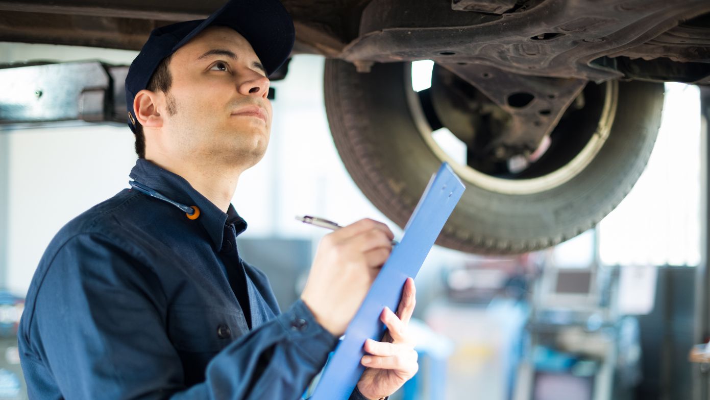 Mechanic conducting an MOT test
