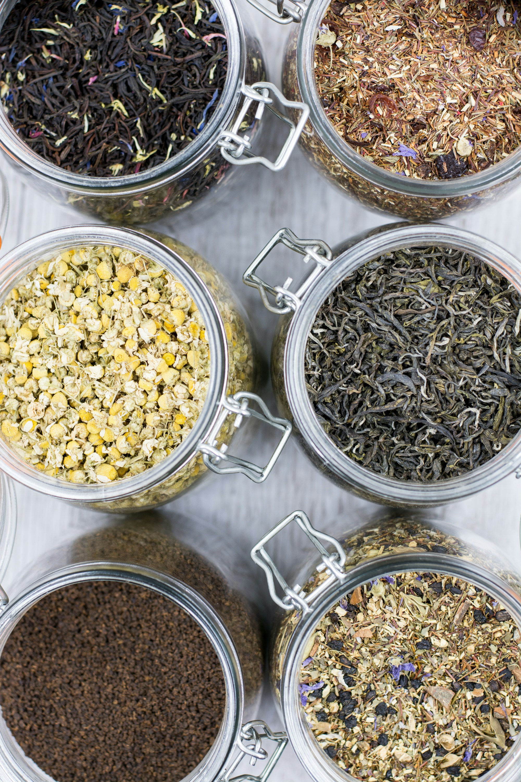 jars of various tea blends and high quality ingredients