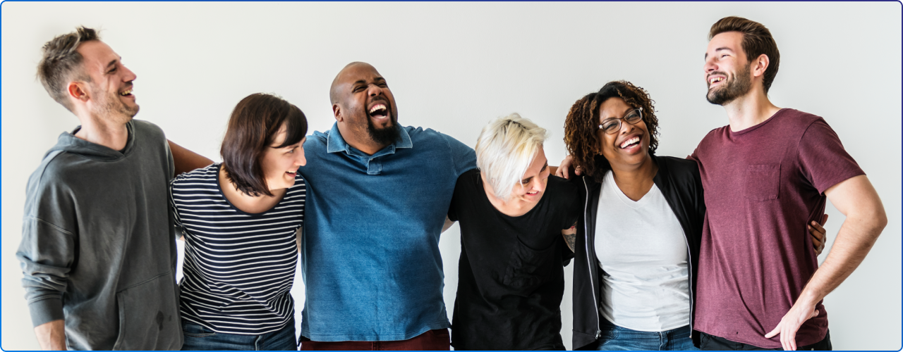 A group of people laughing together