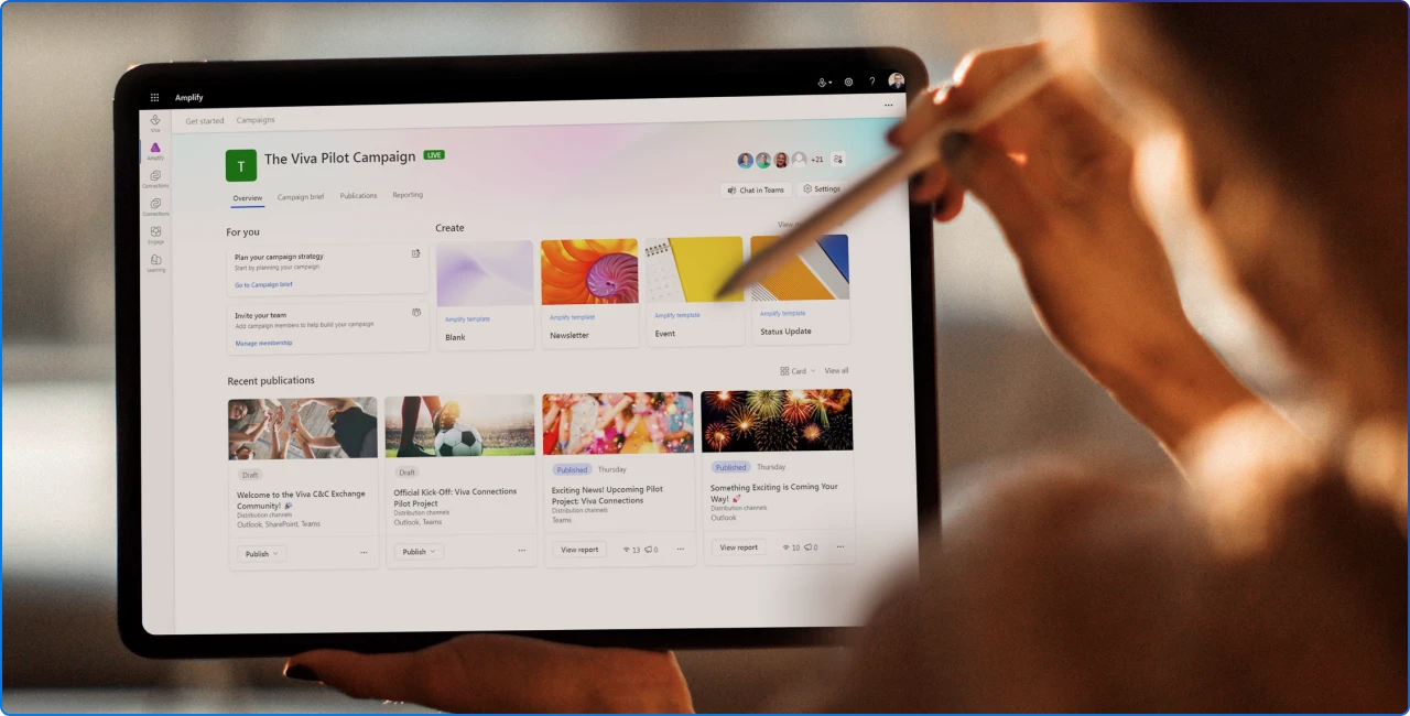 A staff member looking at Viva Amplify