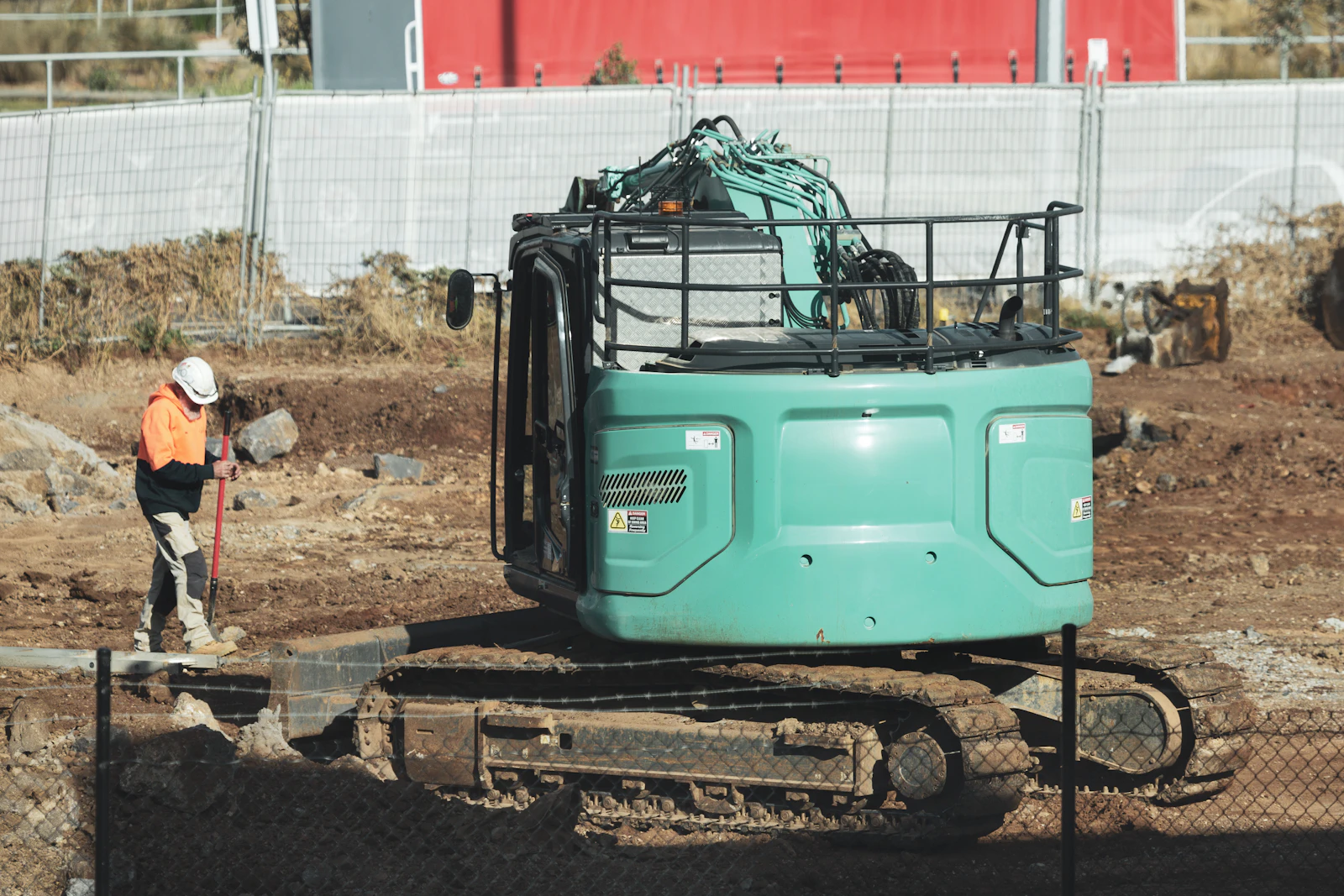 excavator and grapple in construction work