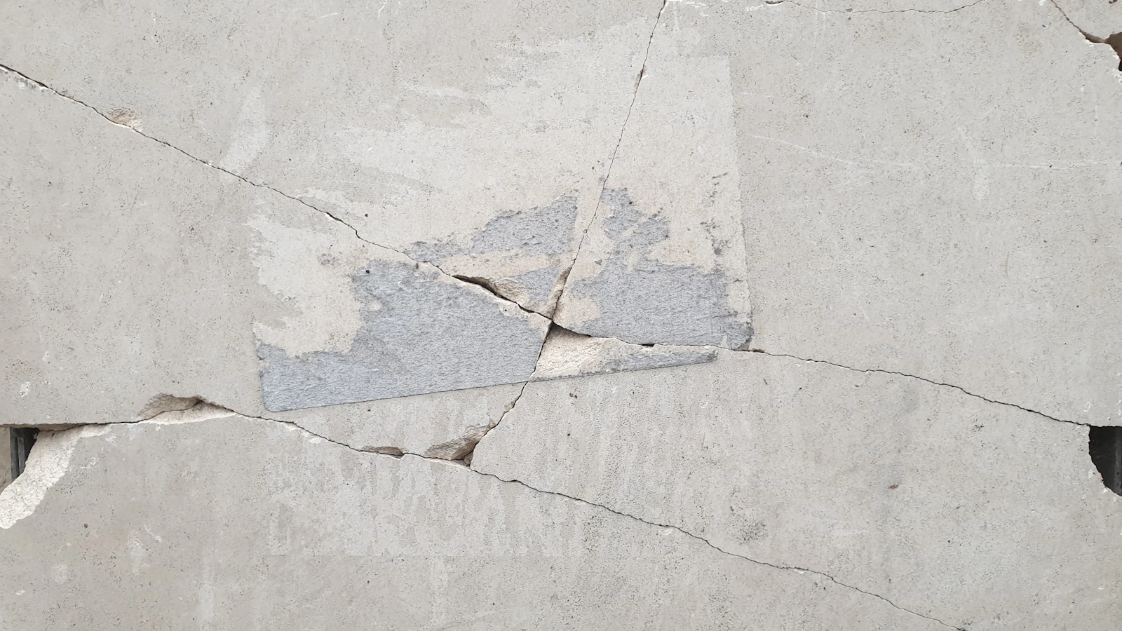 floor and scraper in construction work