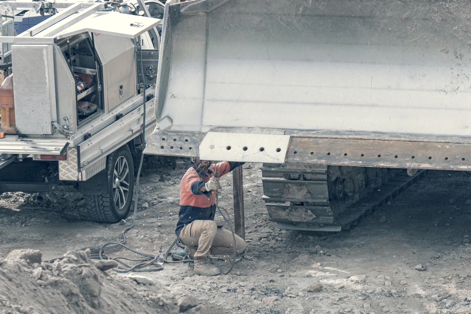 rollback and truck in construction work