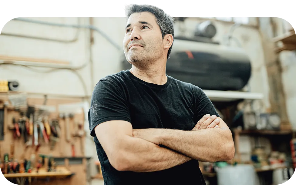 Business owner with arms folded