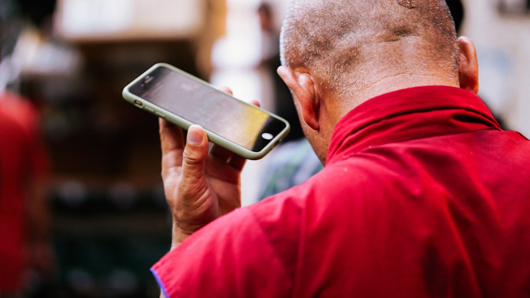 Frontline worker viewing a short video on a mobile phone