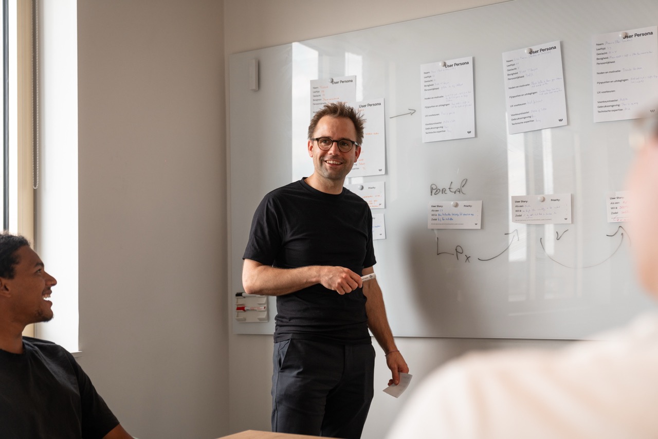 Project manager at whiteboard