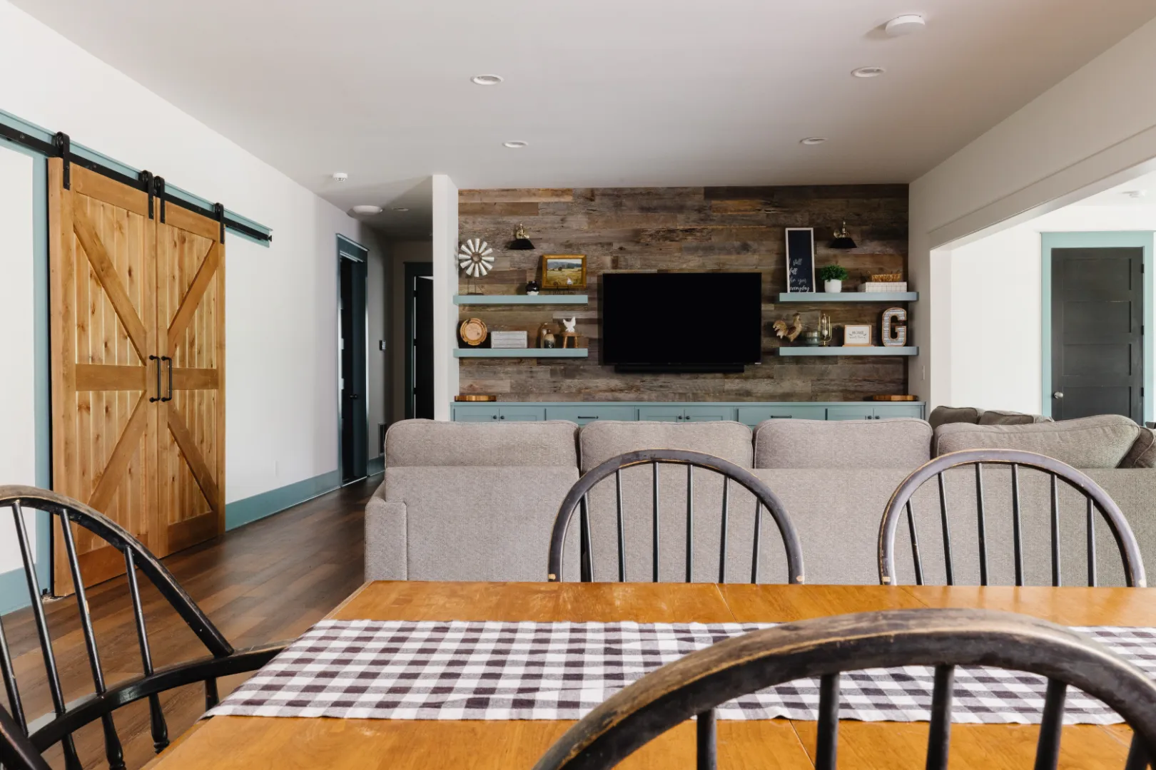 Finished basement with kitchen, family room, and dinner table