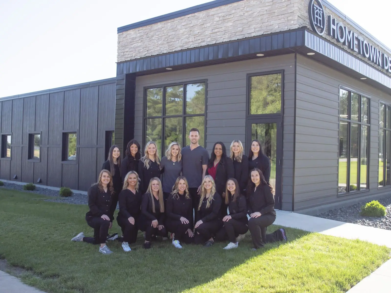 The Hometown Dental team together outside the office