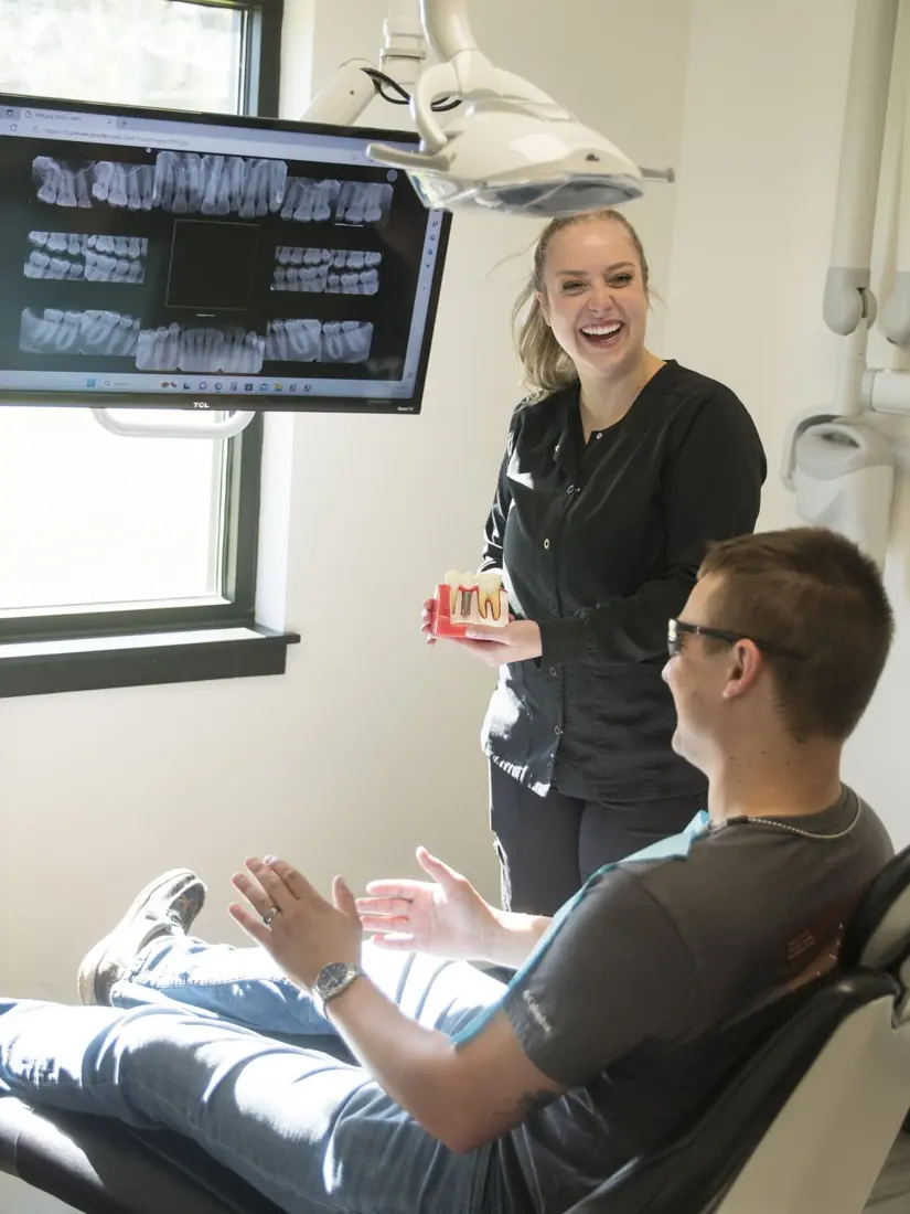 A Hometown Dental team member sharing a laugh with a patient