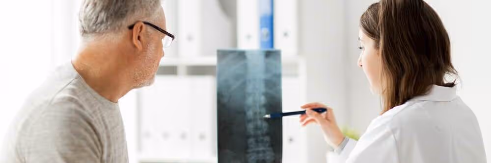 chiropractor and patient talking