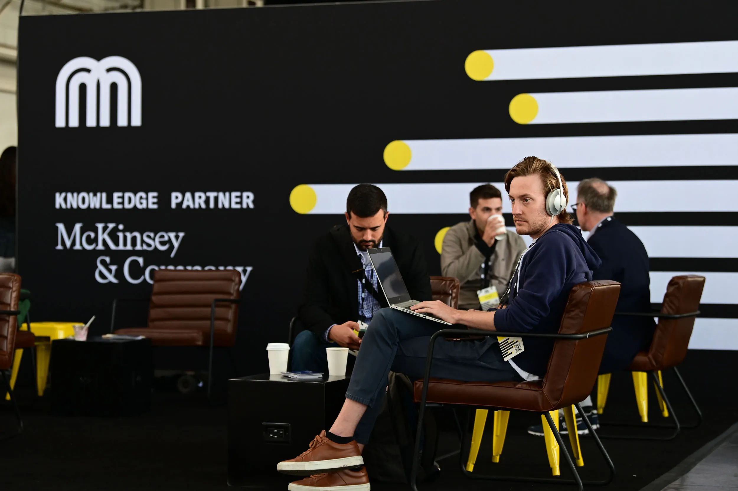 Micromobility America 2022 attendees relax and work in the McKinsey and Company sponsored Investor Cafe