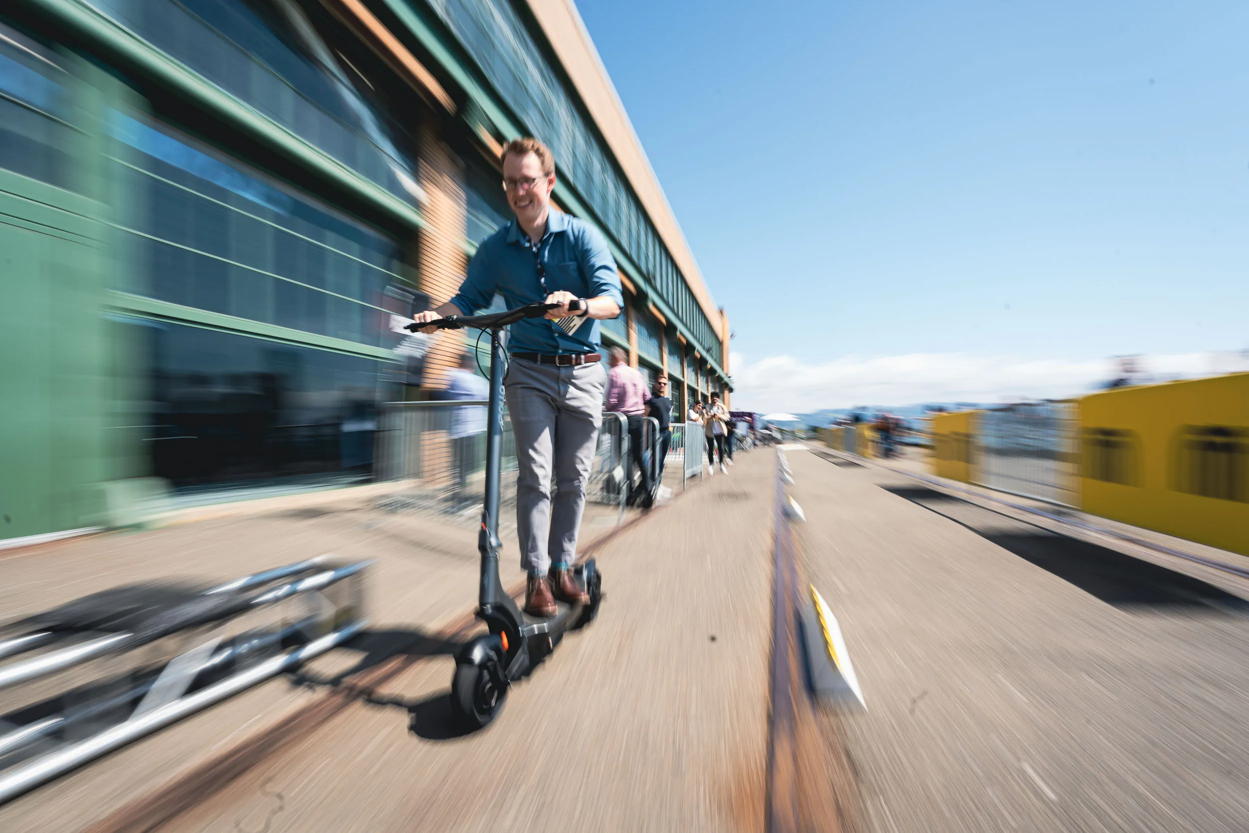 Micromobility America 2022 attendee rides a Apollo Pro electric scooter on the Test Track at Micromobility America 2022