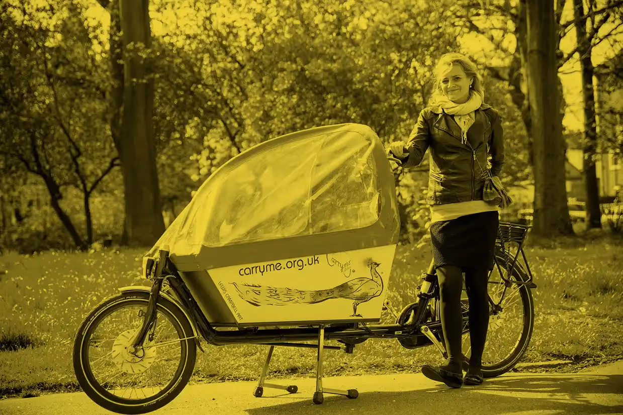 Alix Stredwick stands by a CarryMe Bikes, a social enterprise designed to help families and businesses use e-cargo bikes in their everyday lives.