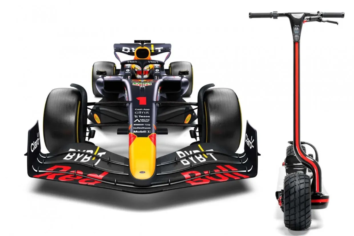 Red Bull all-terrain scooter next to FI racing car