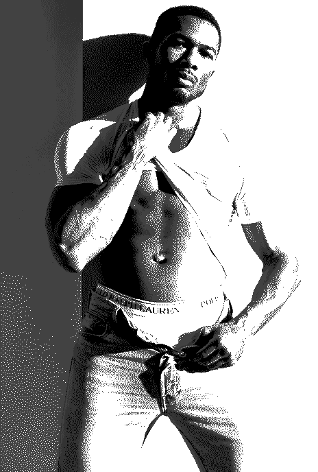 A black-and-white stylized GIF of a muscular man standing against a wall, partially lifting his T-shirt to reveal his abs. He’s wearing jeans and underwear, posed confidently with one hand on his waistband and the other holding the shirt up. Strong contrast lighting emphasizes his physique and shadows.