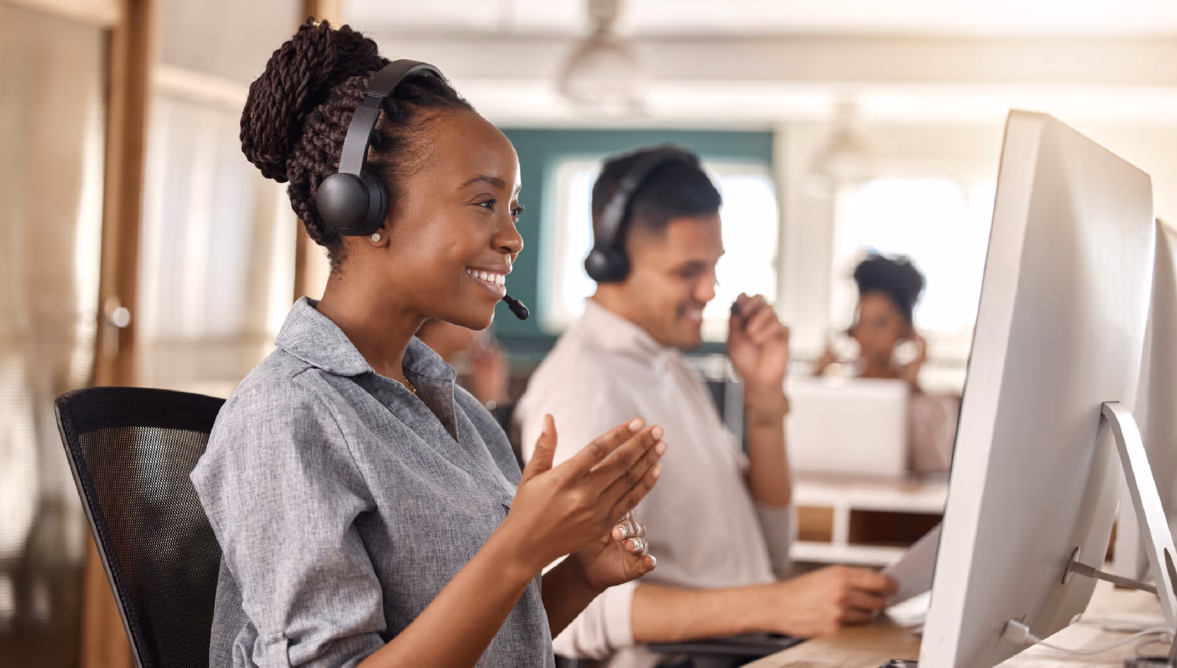 Smiling woman working at call center