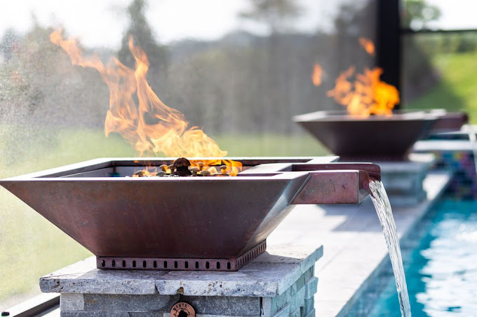 Copper fire bowls and water spillways