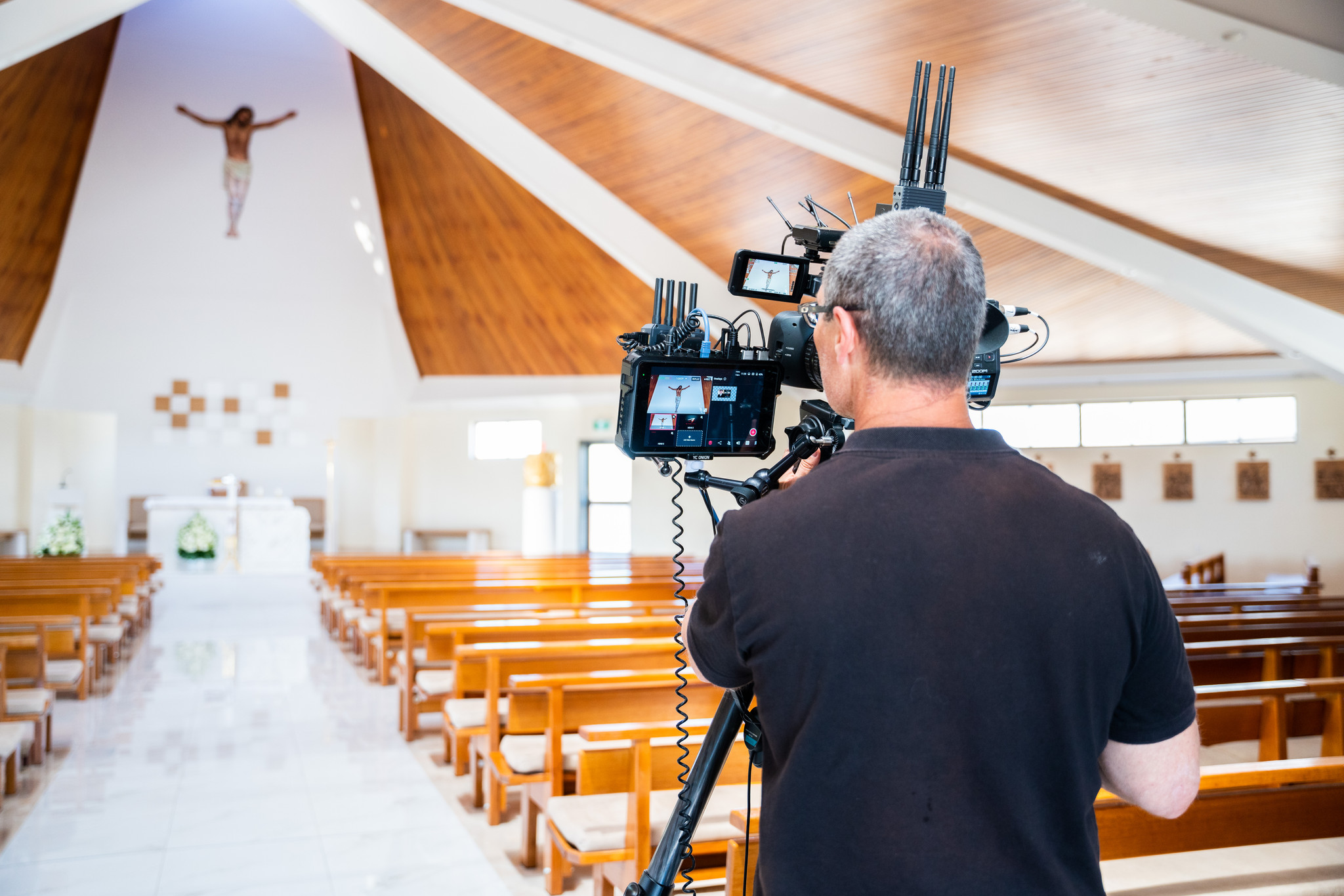 Video camera streaming a funeral event