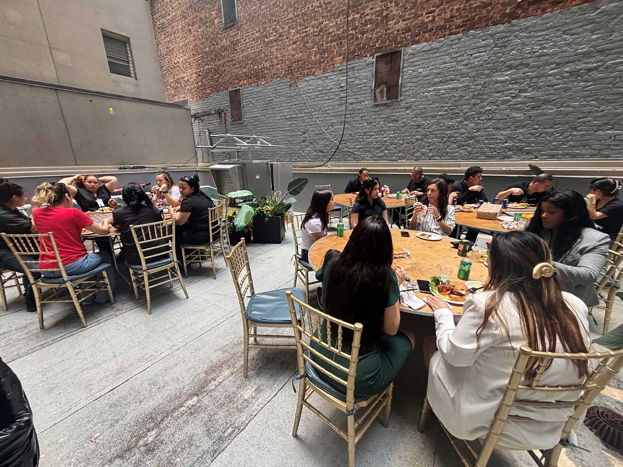 The incredible crew of the SpringHill Suites New York Manhattan Times Square enjoy an Independence Day meal.