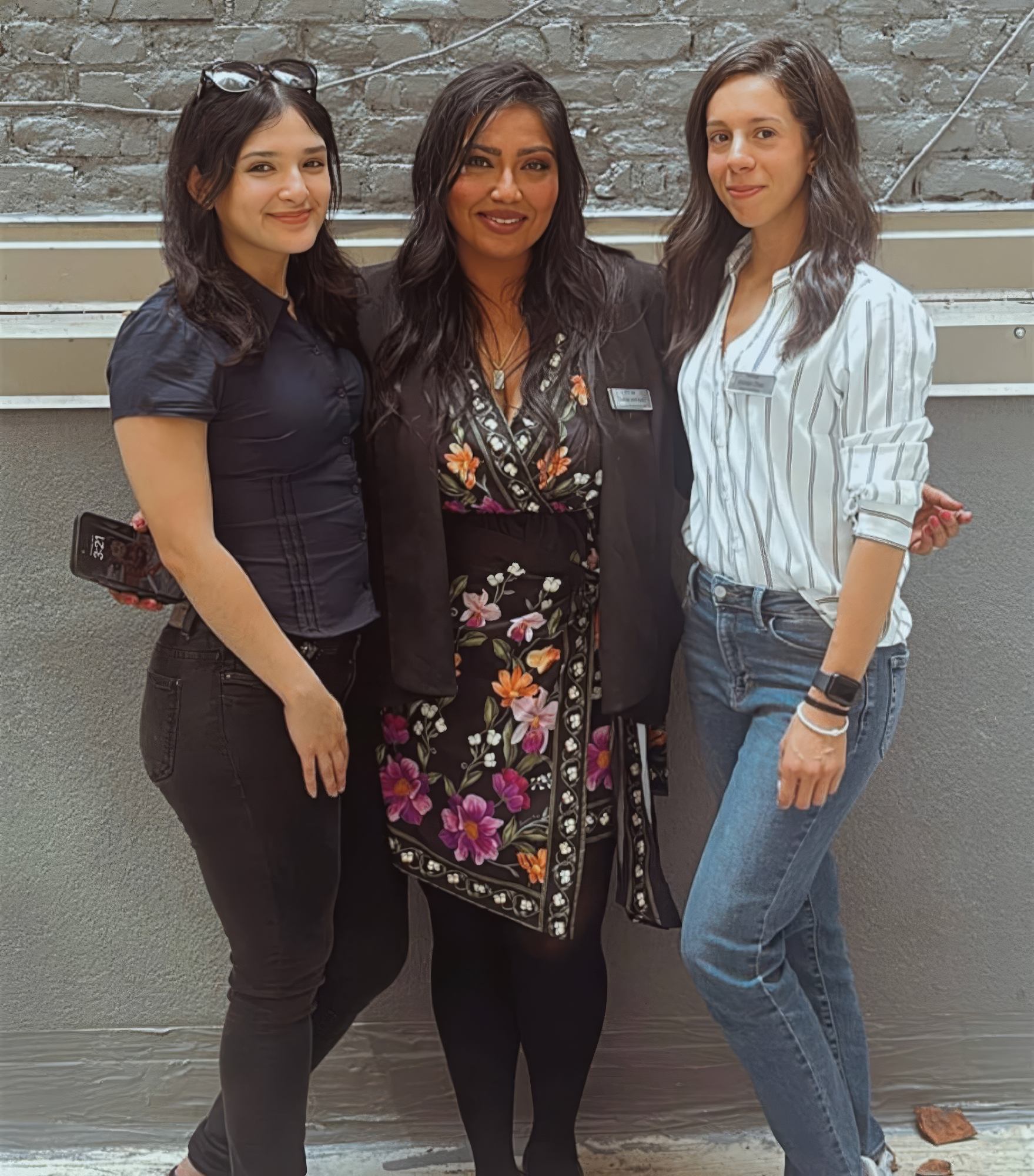Front Office Manager Brianna Gutierrez, Assistant General Manager Sana Arshad and Sales Coordinator Vivian Diaz celebrate July 4 at the SpringHill Suites New York Manhattan Times Square.