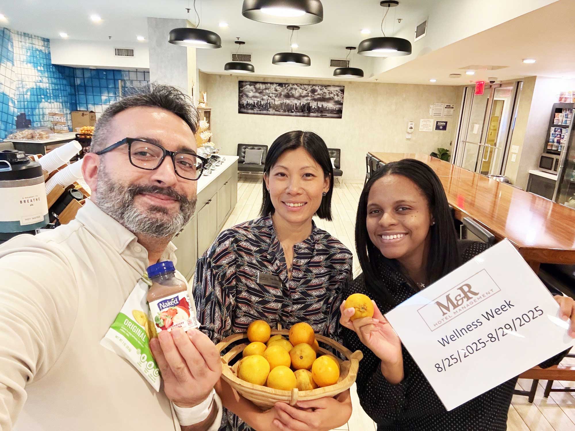 Enjoying ‘Wellness Week’ treats at the Fairfield New York Manhattan/Central Park are, from left, Neil Genel, M&R talent acquisition manager, General Manager Yan Chung and Room Division Manager Janeel Brown.