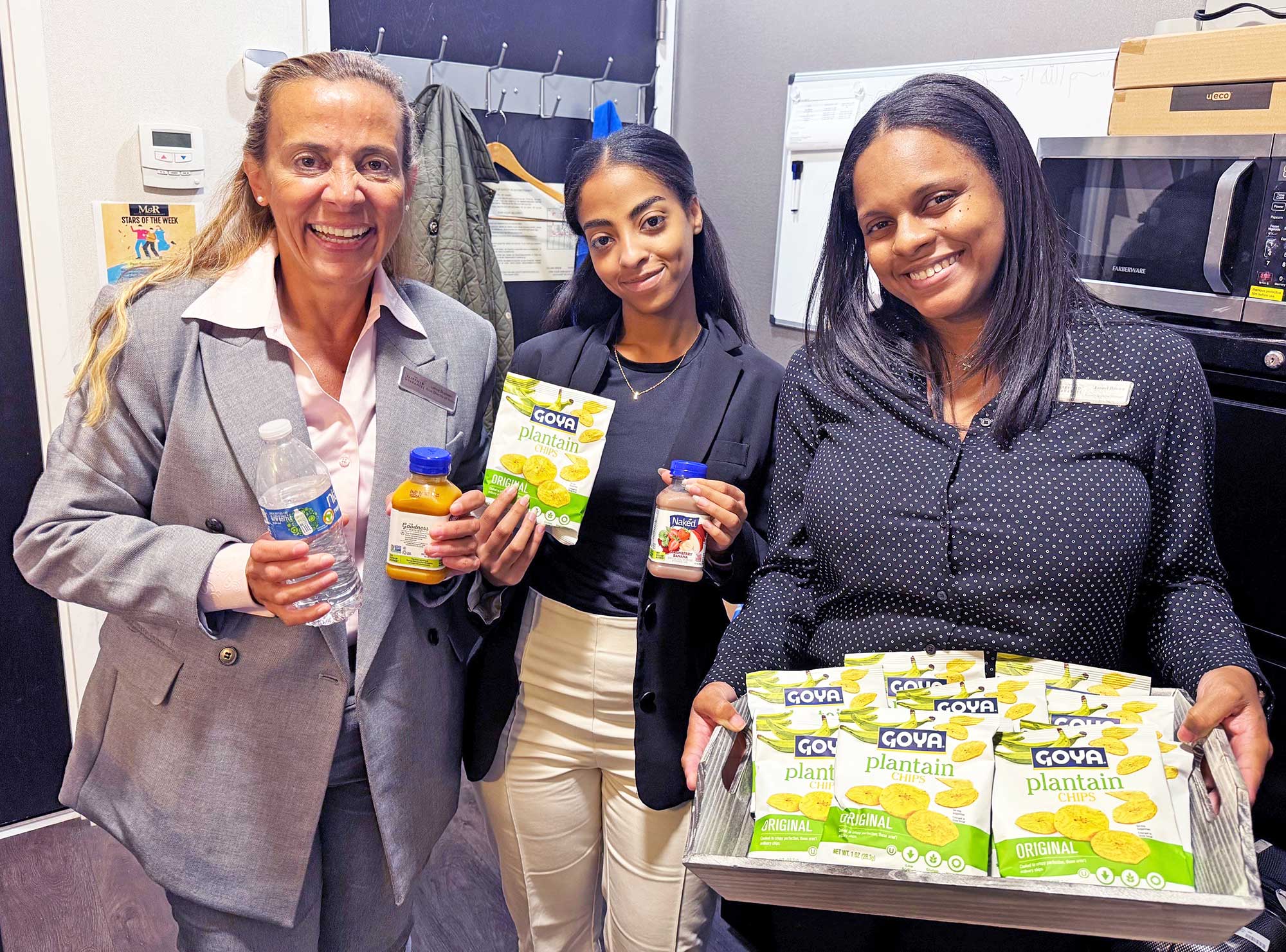 Lenna Shaheen, area director of sales & marketing for the Fairfield New York Manhattan/Central Park and SpringHill Suites New York Manhattan Times Square; Ibtihal Abdalla, sales coordinator; and Janeel Brown, room division manager, at the Fairfield New York Manhattan/Central Park, select healthy snacks during ‘Wellness Week.’  