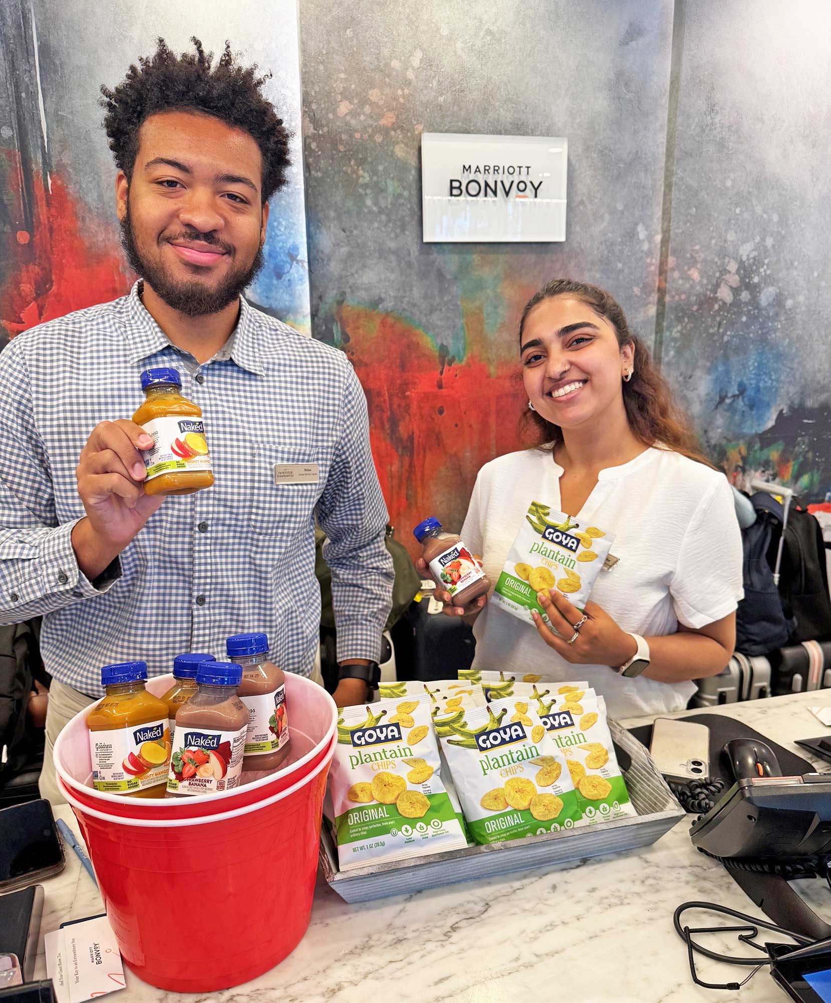 Brian Colon and Isha Rashid share plantains and fruit smoothies during ‘Wellness Week’ at the Fairfield New York Manhattan/Central Park.