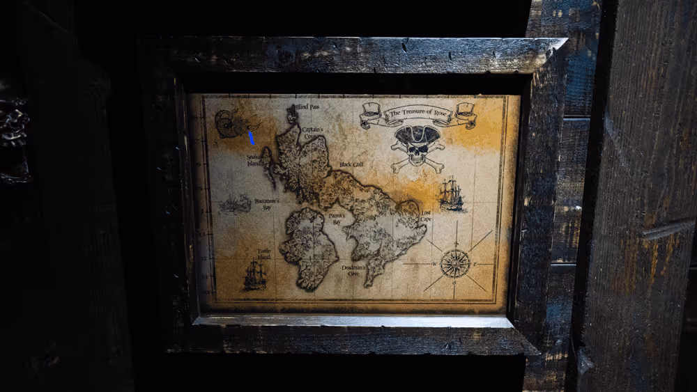 A map of the world is displayed in a wooden frame.