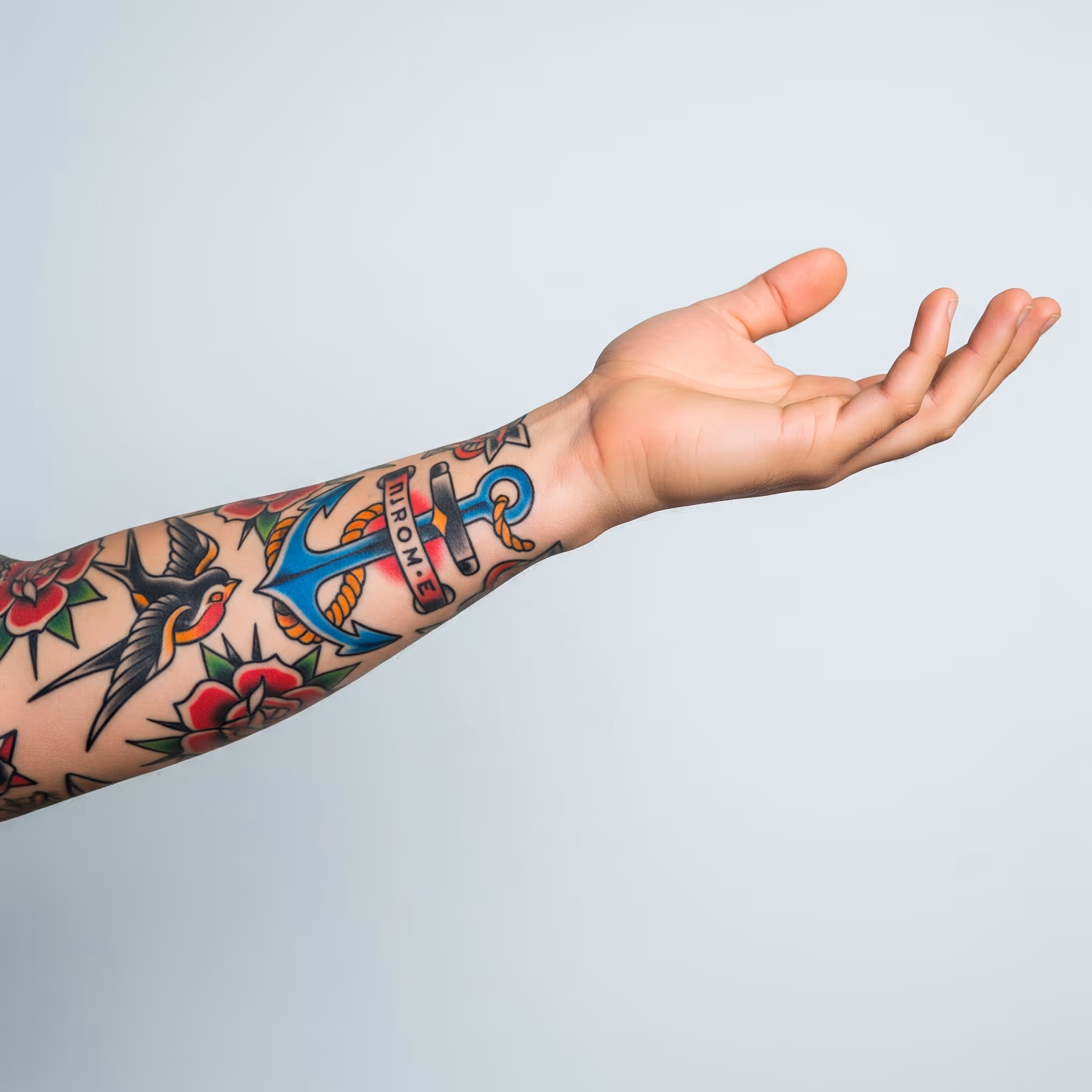 Colorful tattoo on forearm with palm facing up