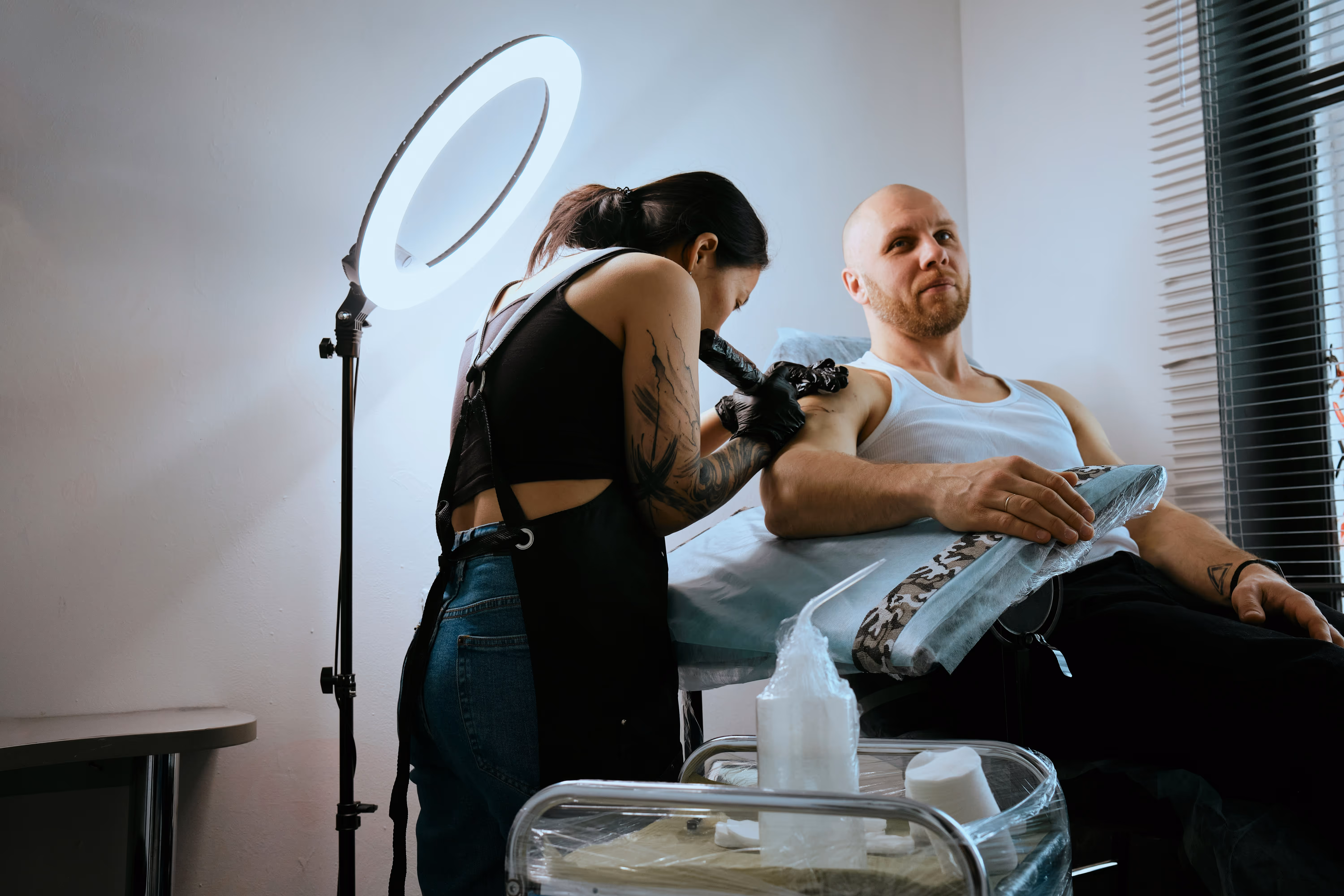 Tattoo artist giving a tattoo
