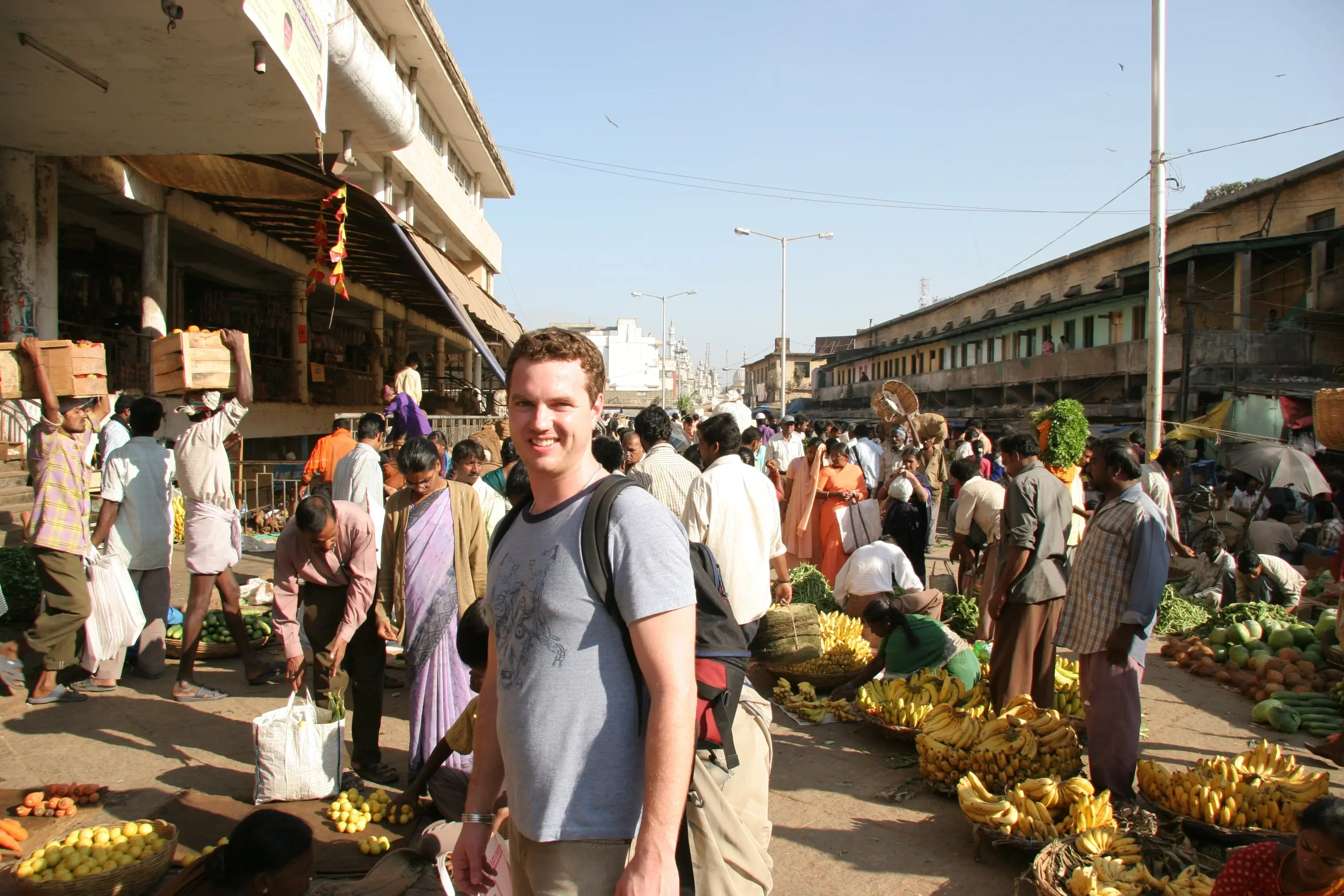West standing at a market