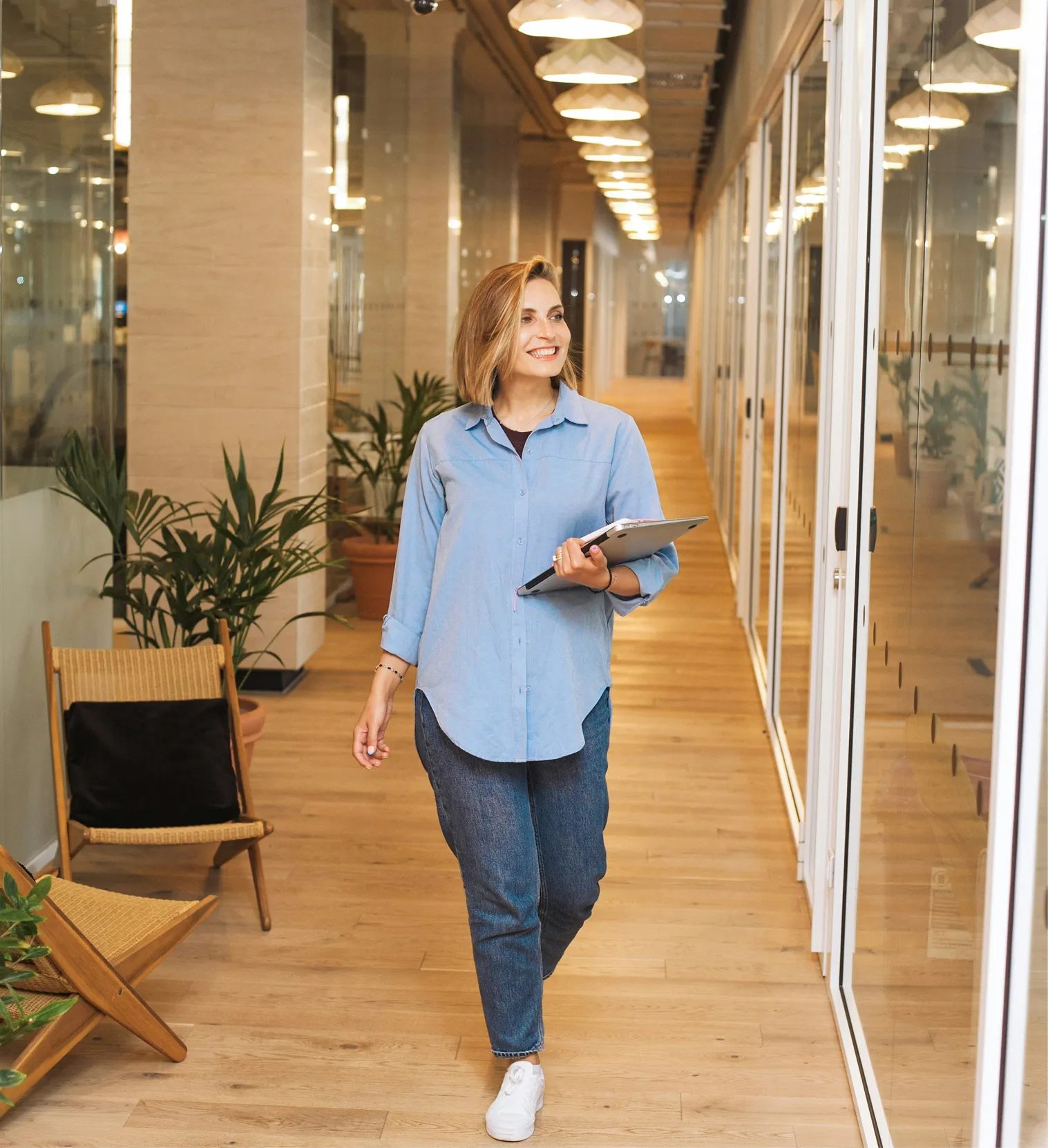 Woman runs through office
