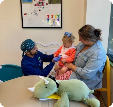 Bright-and-cheerful reception desk at Lil’ Dente Pediatric Dentistry, Darien