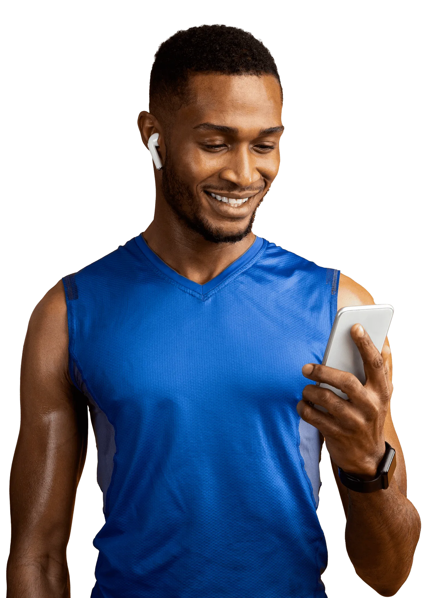 Smiling man in a blue workout tank looking at his phone