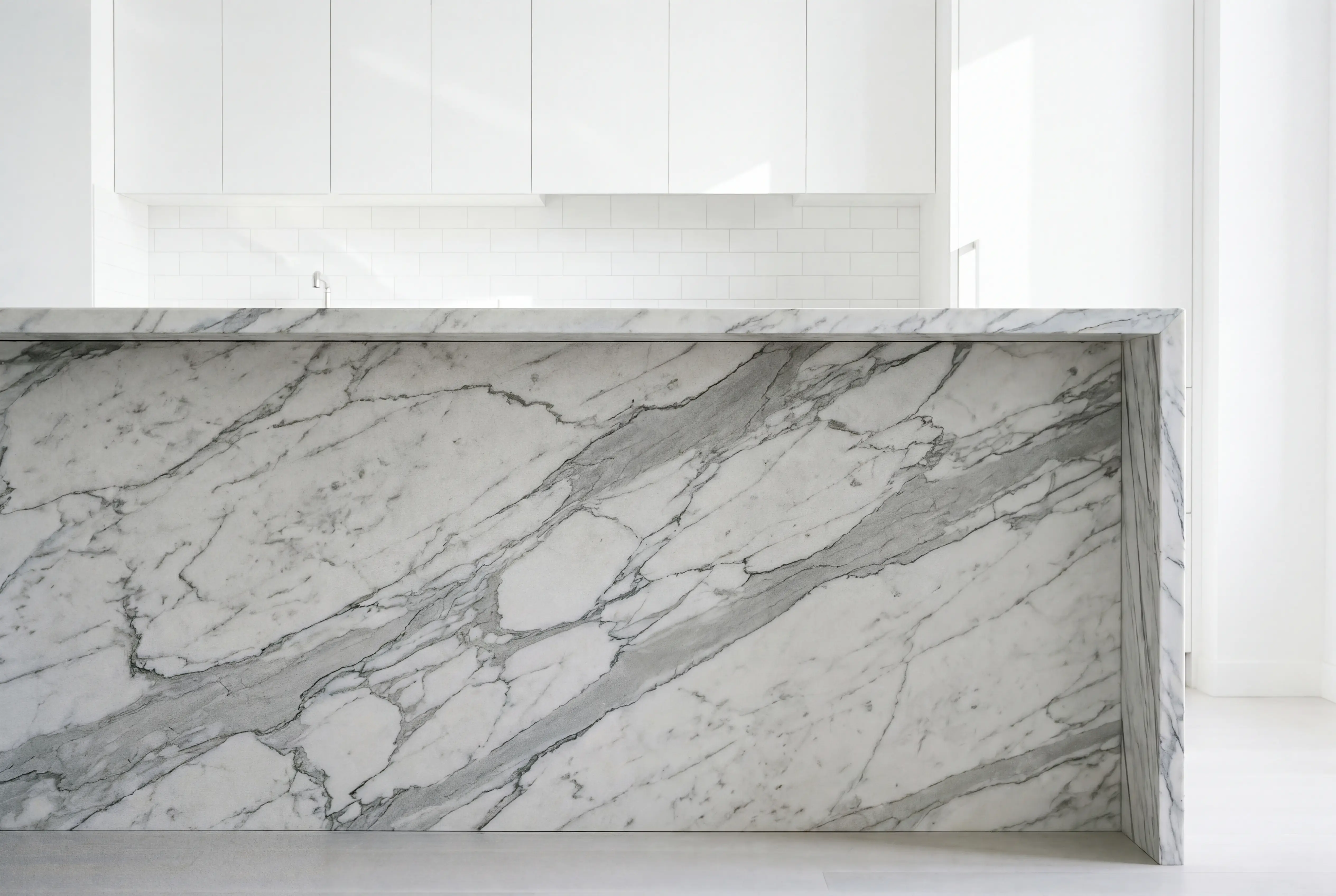 statuario marble waterfall island manhattan apartment