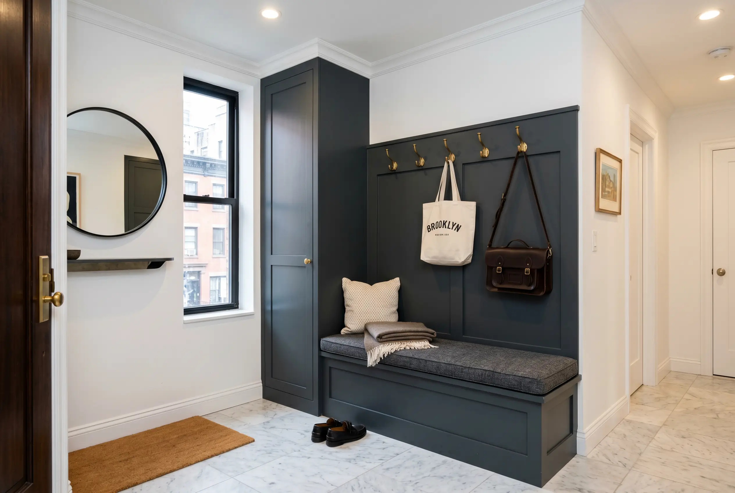 entryway window seat bench with storage hooks custom millwork manhattan