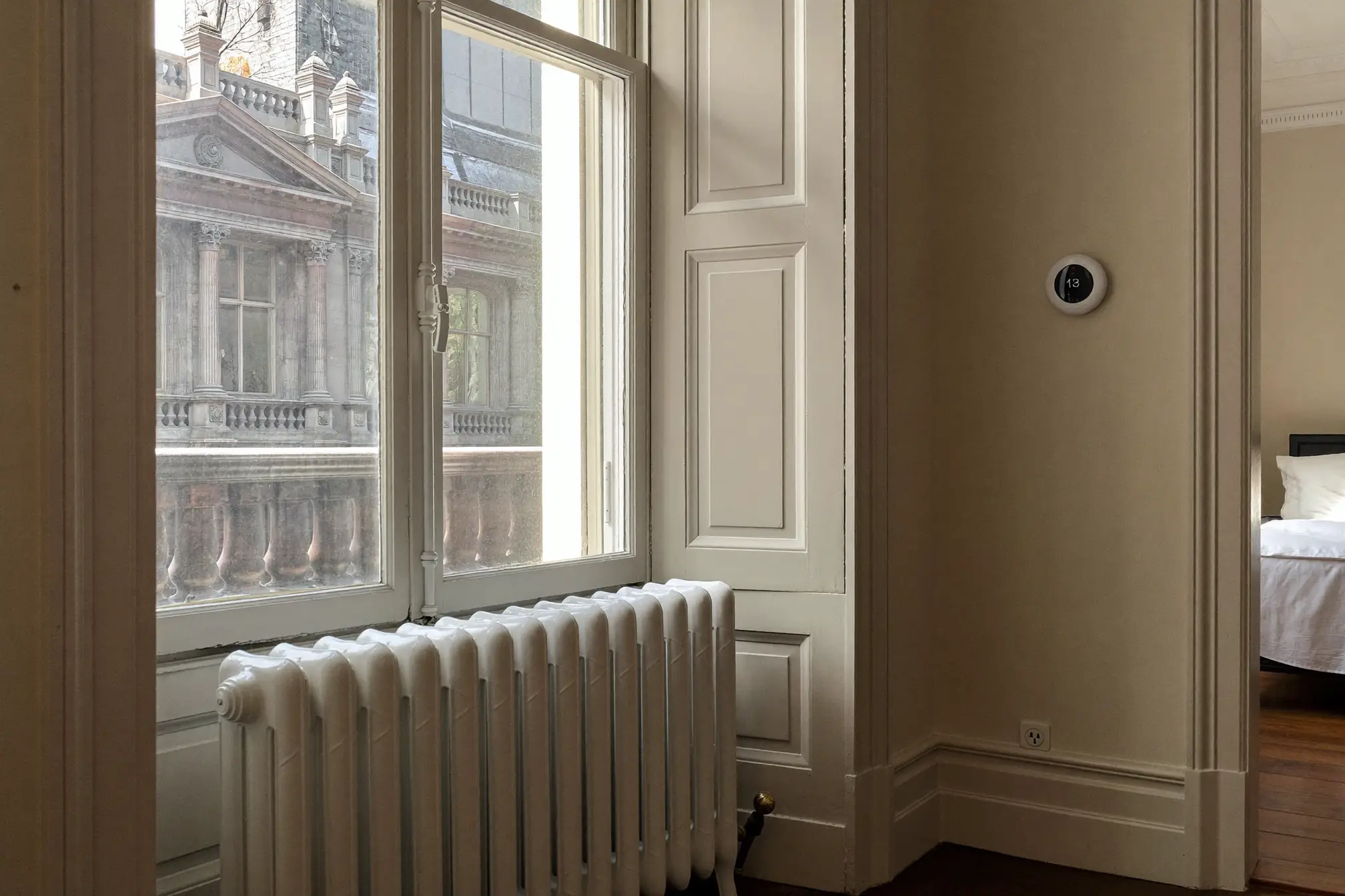 pre-war manhattan apartment steam radiator smart thermostat historic building