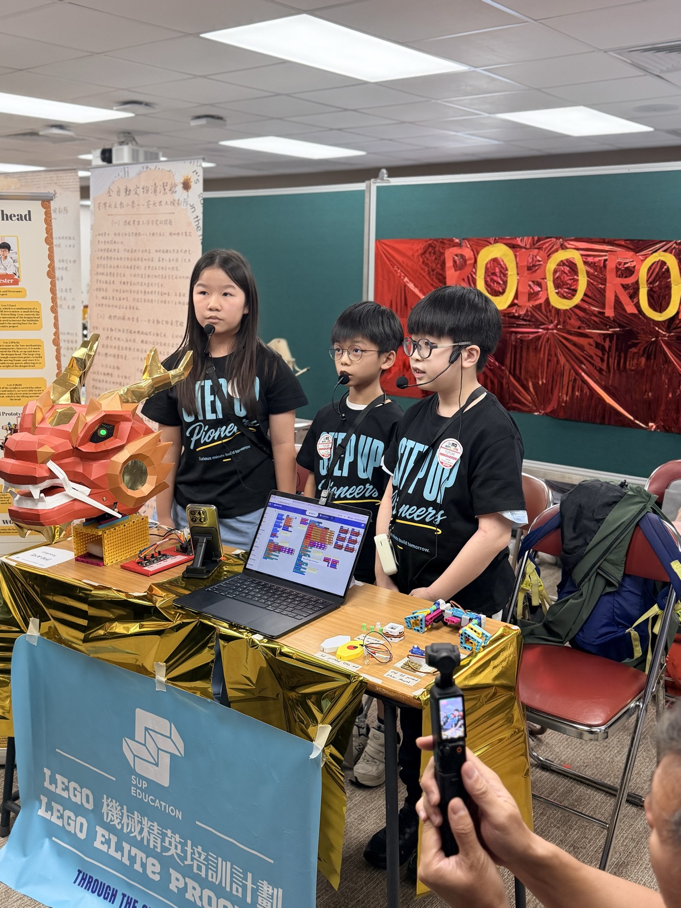 Students at their project display