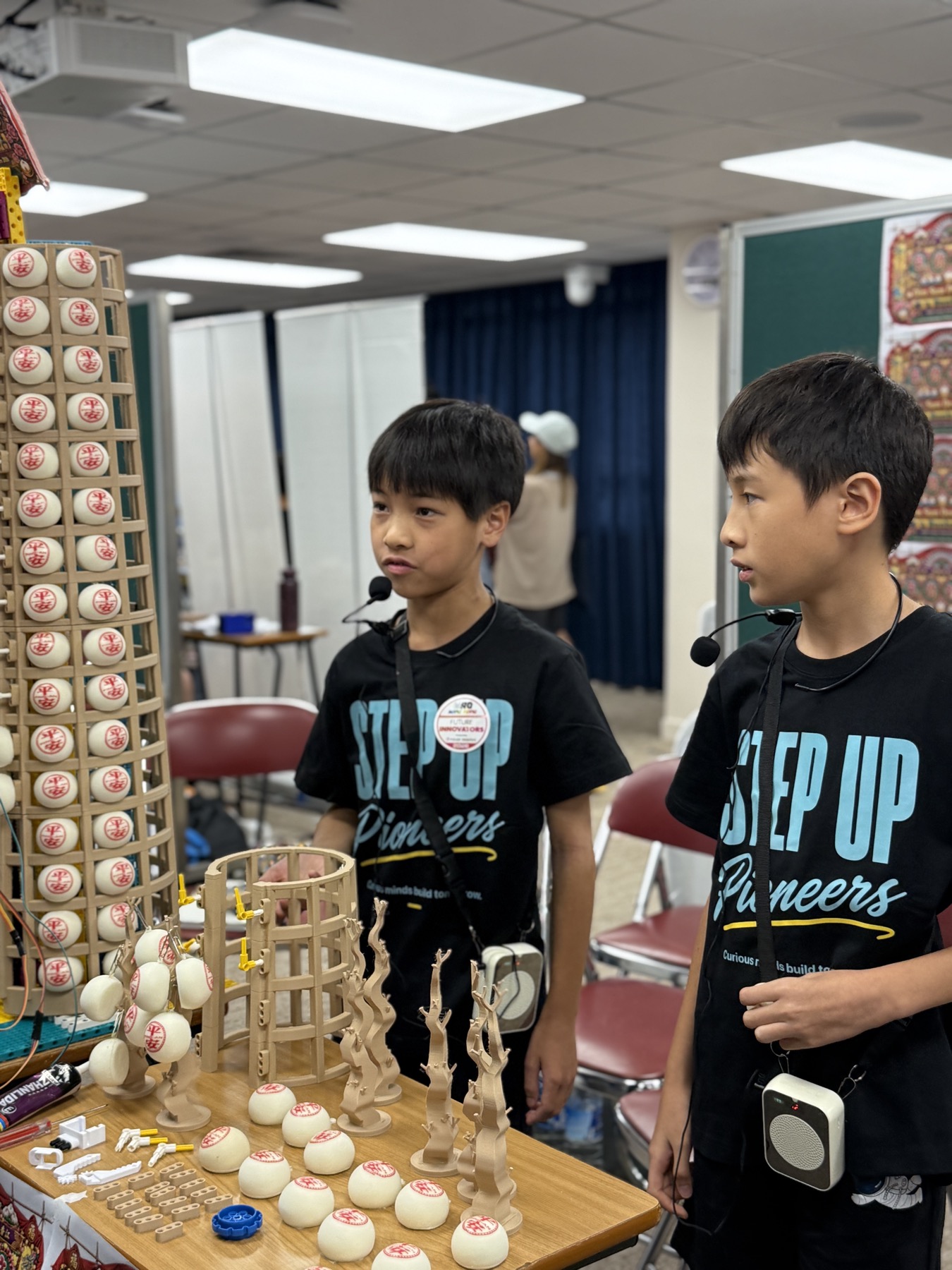 Students explaining the controls