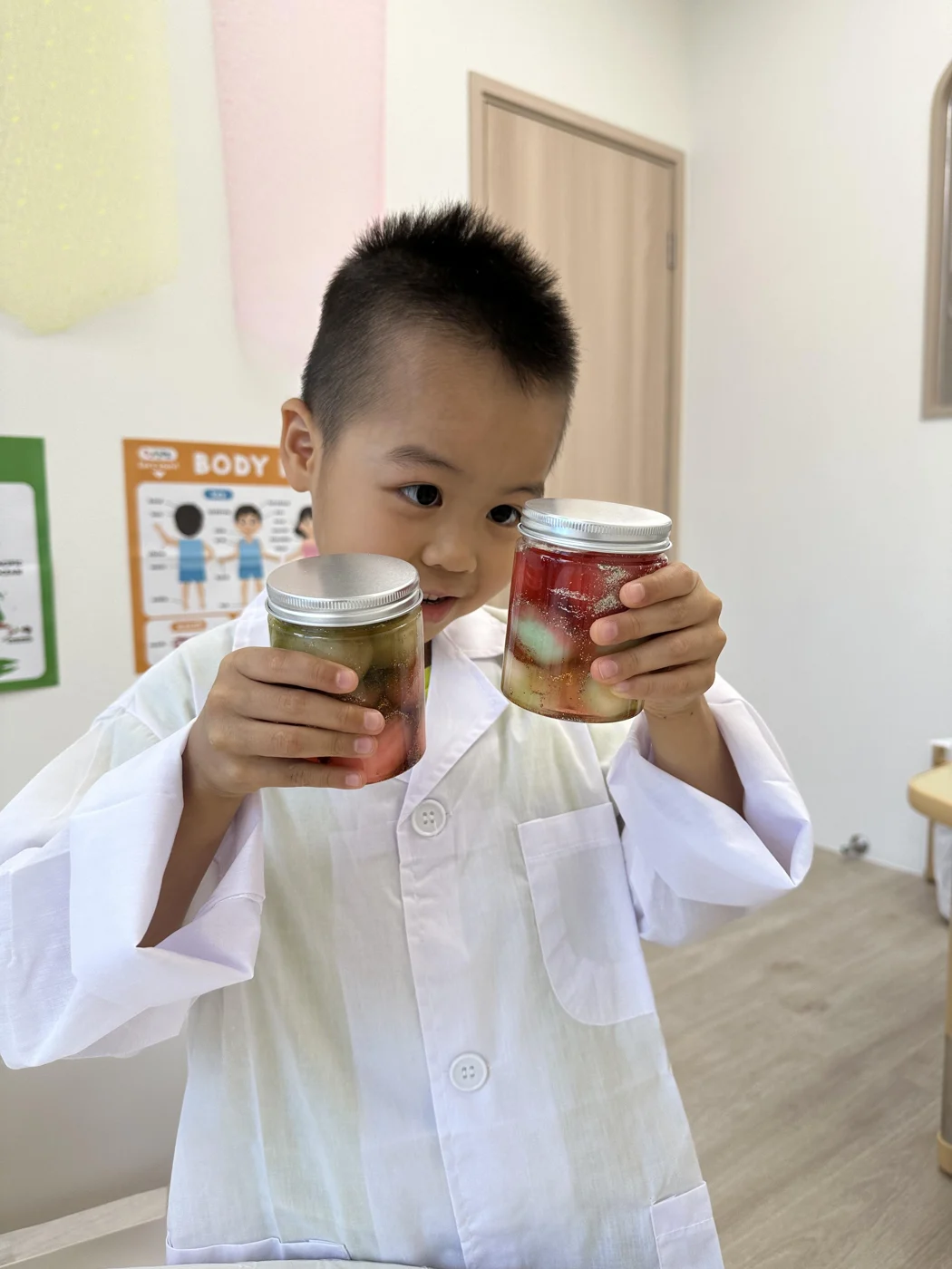 A student comparing jars during a science activity