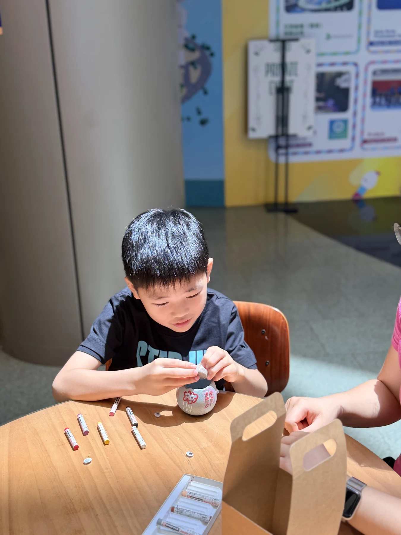Parents and children exploring food and growing at SEED by Farmacy, Cyberport