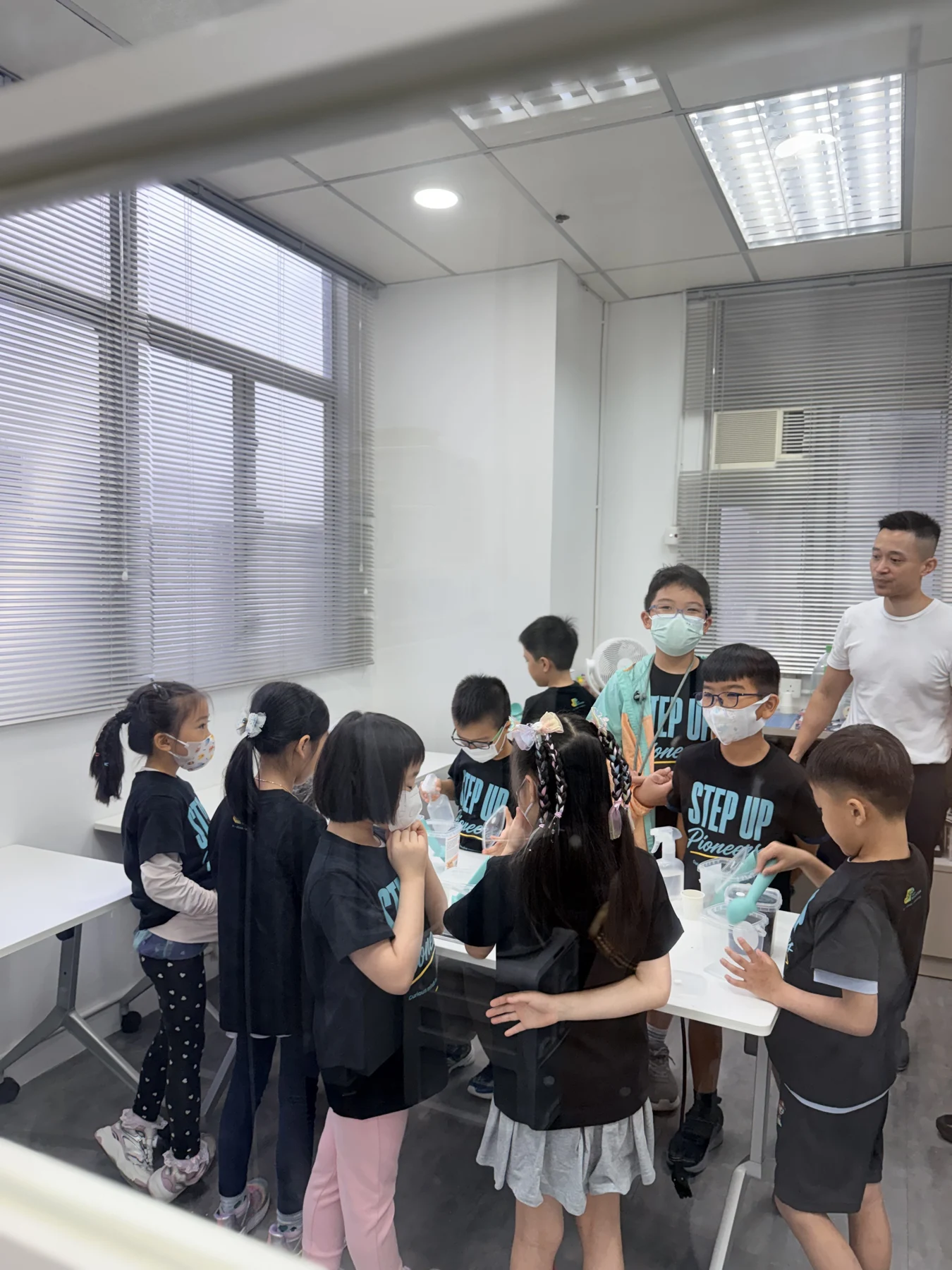 Students exploring mushroom growing and preparing take-home kits at Myconoko Lab