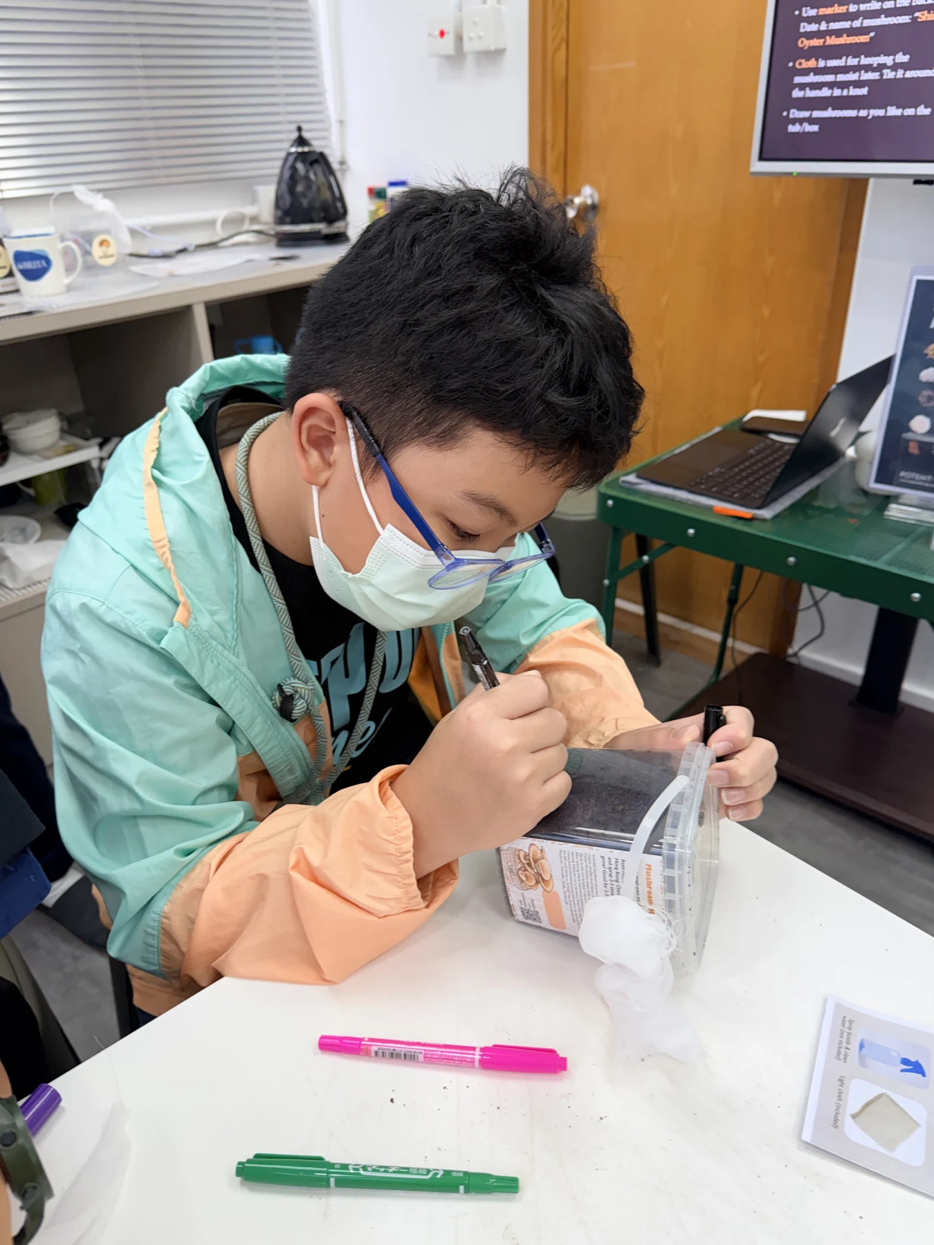 Students exploring mushroom growing and preparing take-home kits at Myconoko Lab