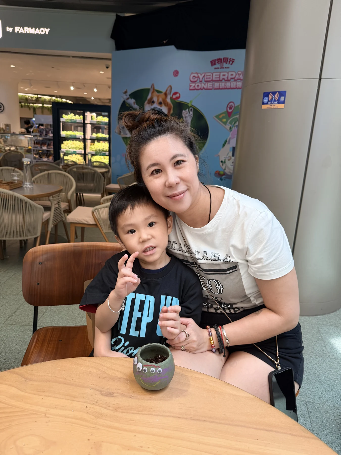 Parents and children exploring food and growing at SEED by Farmacy, Cyberport