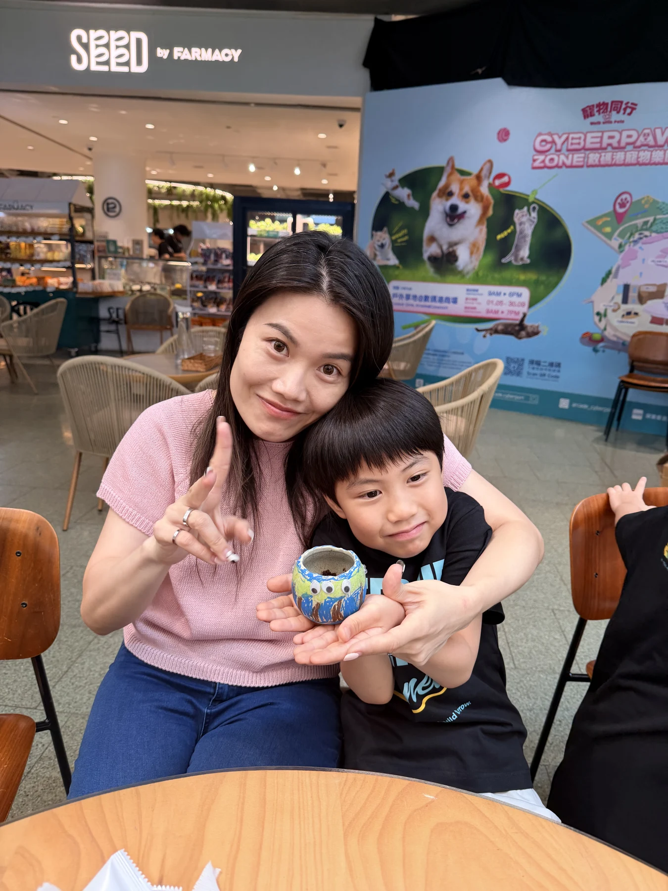 Parents and children exploring food and growing at SEED by Farmacy, Cyberport