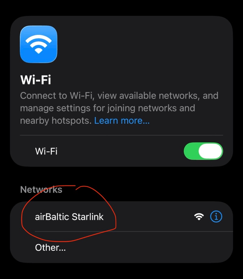 iPhone Wi-Fi settings showing the “airBaltic Starlink” network circled in red.