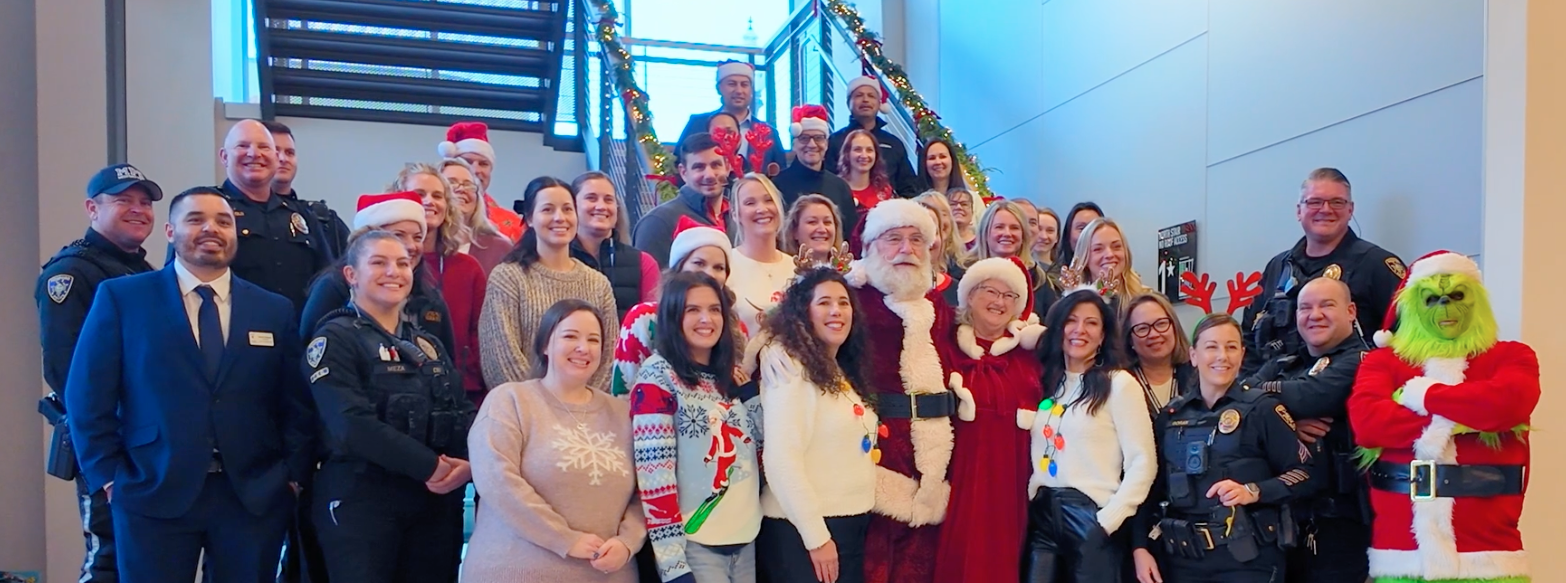 group of volunteers smiling at the Medford Home Office