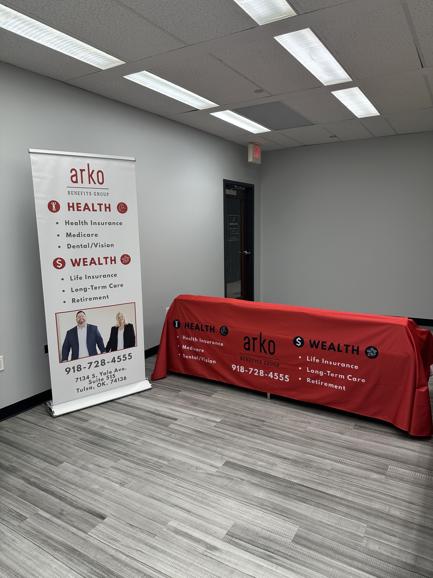 Retractable banner and custom tablecloth for events and tradeshows for Tulsa business created by Opveon Creative
