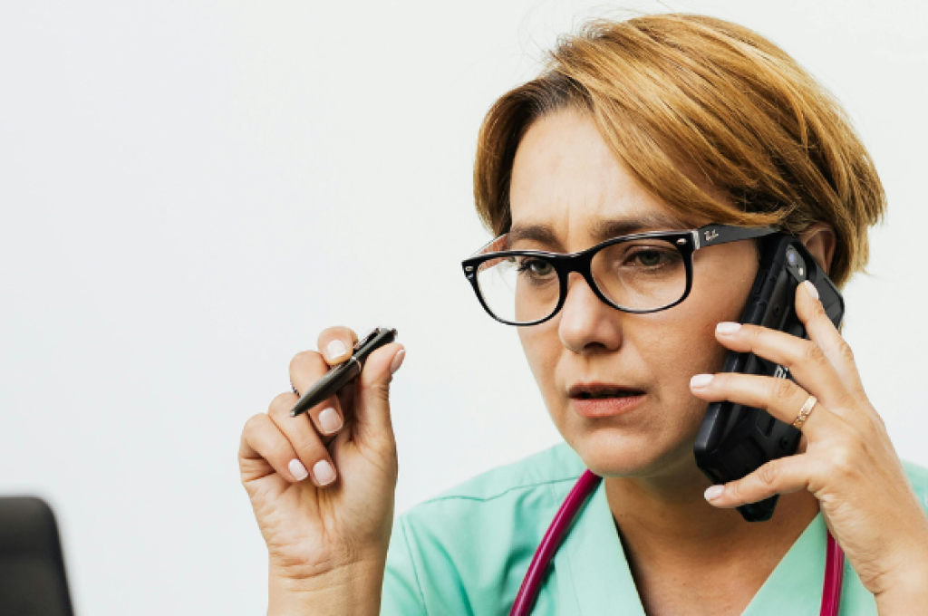 a doctor answering the phone